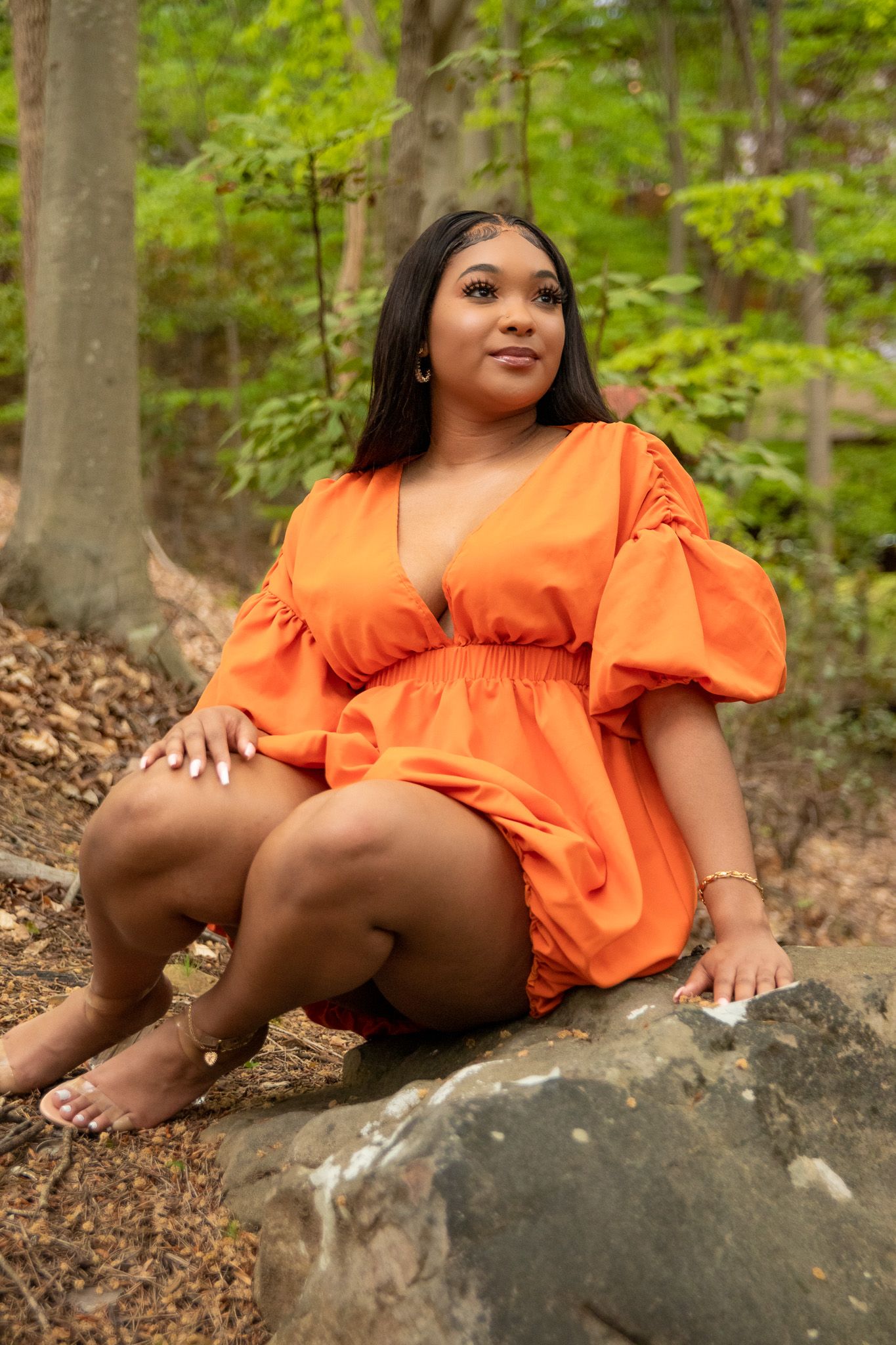 Sharp photo of a girl posing on a rock outside of Samford University in Birmingham, AL.
