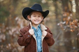 young boy wearing cowboy hat portrait photographer royse city texas