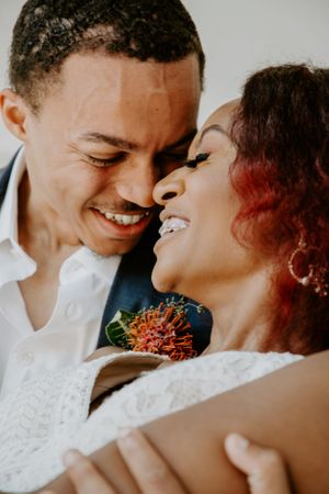 Intimate close-up of a romantic wedding moment with soft natural lighting.