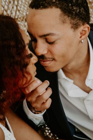 Intimate wedding portrait showing tender moment between couple.
