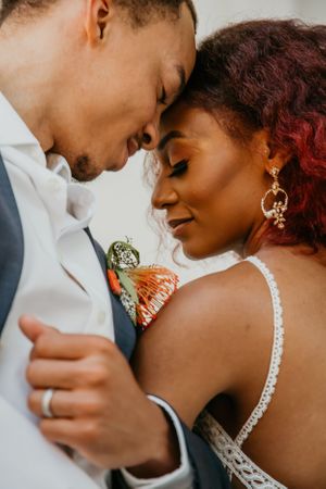 Close-up romantic wedding portraits showing delicate details and intimate moments.