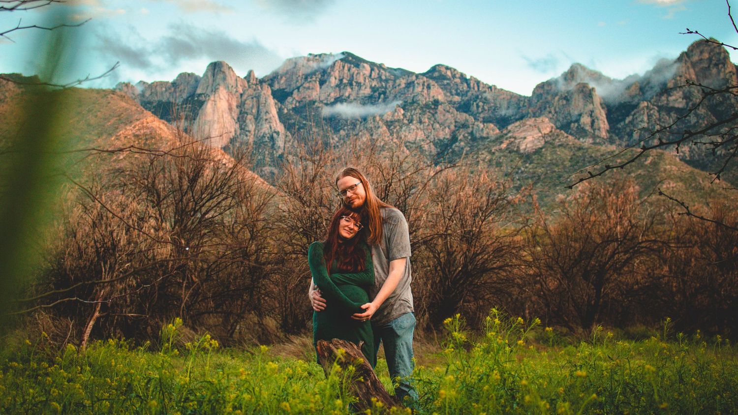 Scenic mountain landscape backdrop during outdoor photography session at sunset.