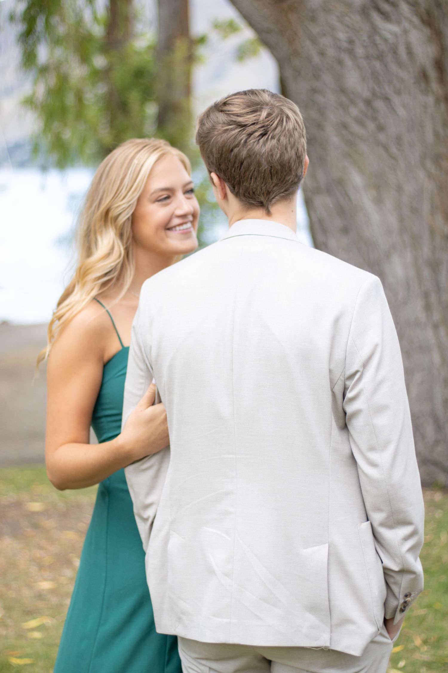 Bride and groom surrounded by wildflowers in a dreamy Okanagan meadow