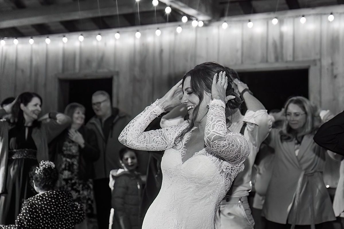 Bride dancing macarena at wedding reception captured by Indianapolis Indiana wedding photographer