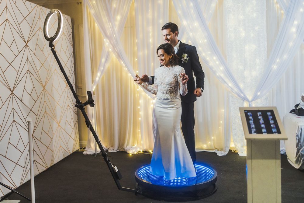 Wedding Couple using 360 booth during their reception at Allely Estate