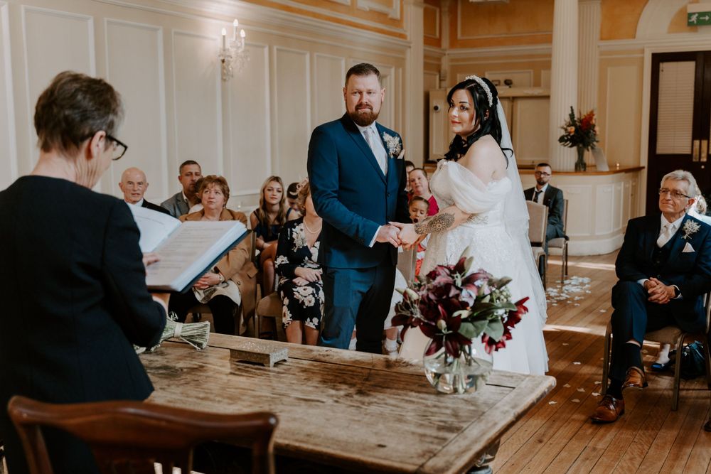 a bride and groom exchanging vows.