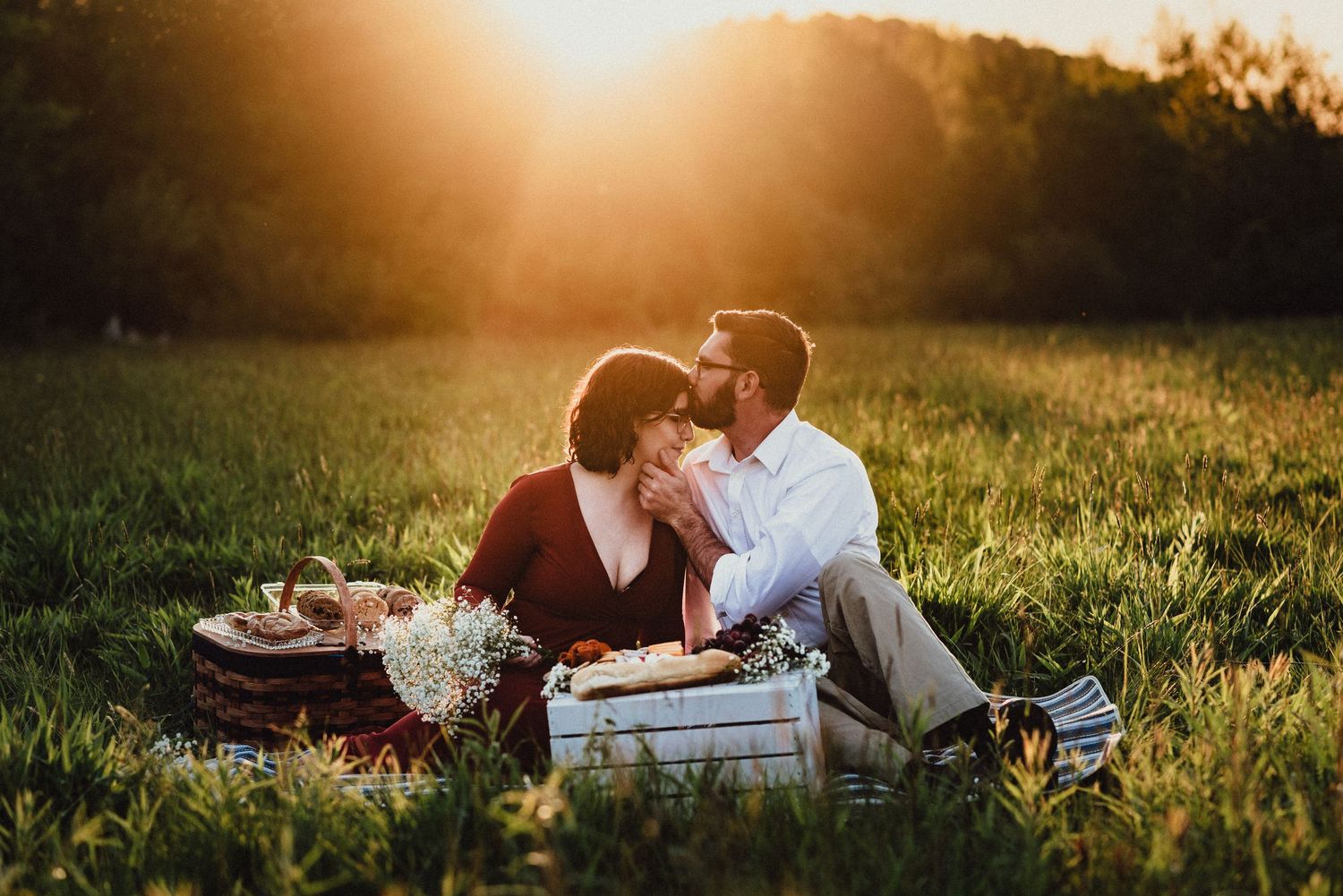 Couple enjoy a romantic evening picnic at sunset in Fairmont, WV