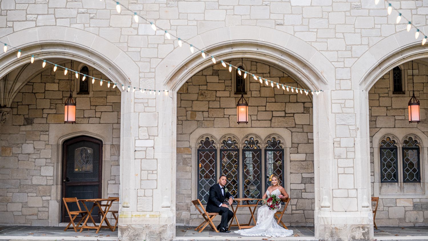 Couple enjoying a moment seated in a gallery at Plantingfield. Wedding Photo Location