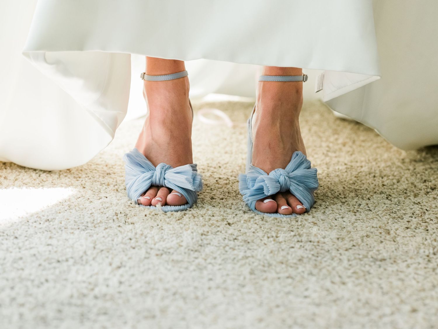 wedding picture of blue shoes with bow