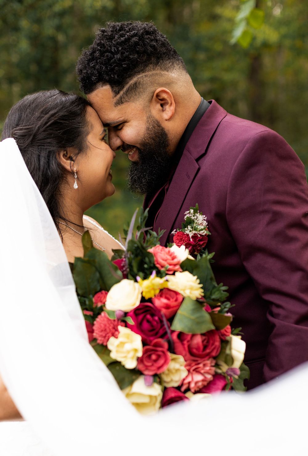 Close-up wedding photography sequence featuring a burgundy bouquet with roses.