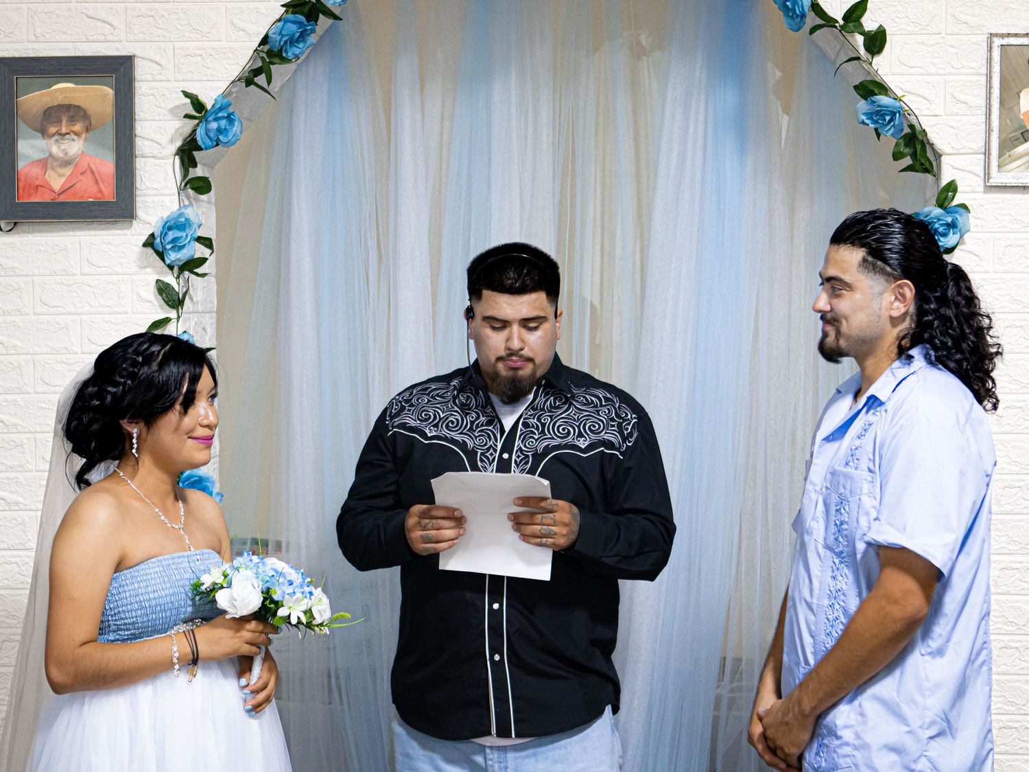 bride and groom at the alter