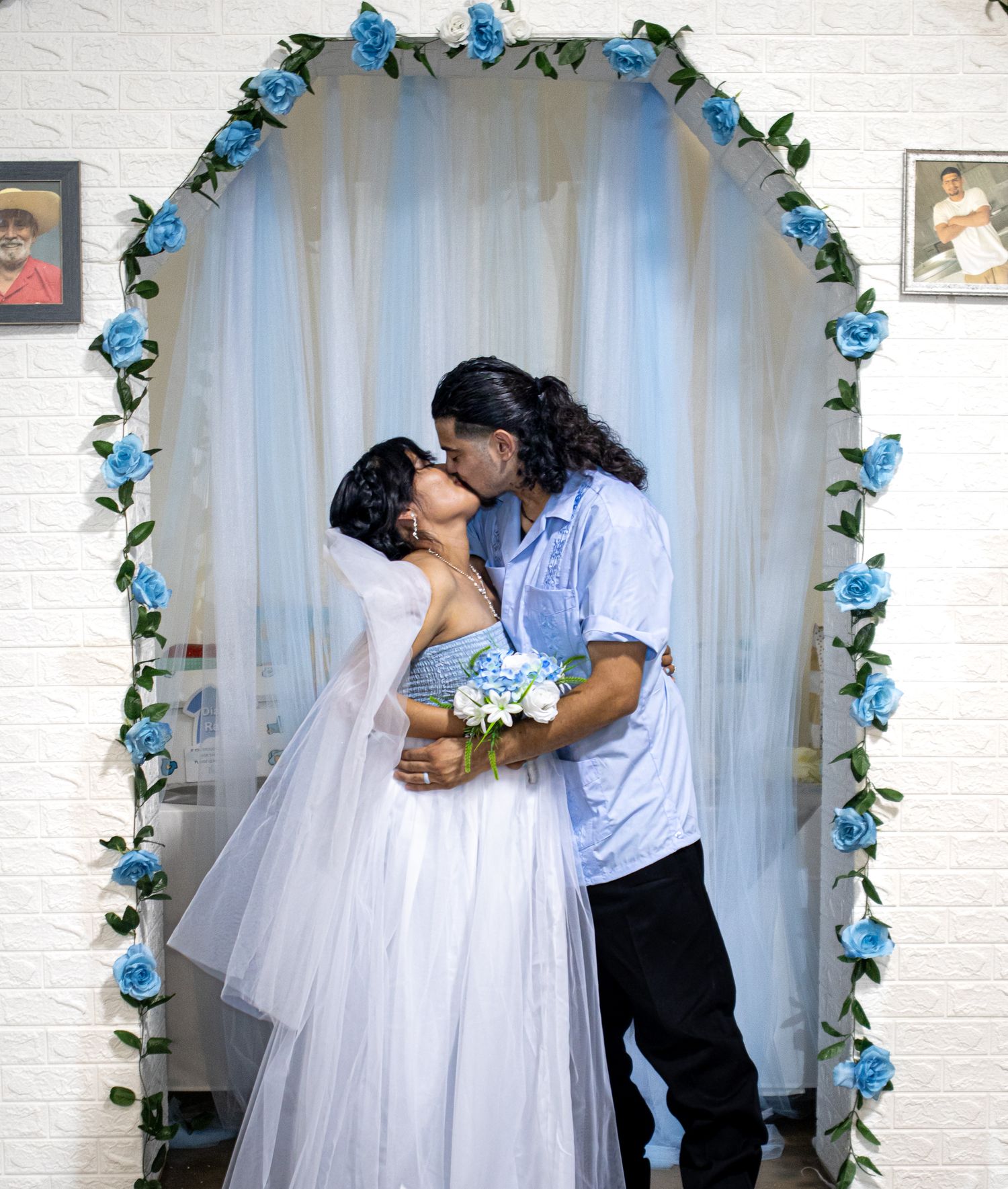 Bride and groom kissing