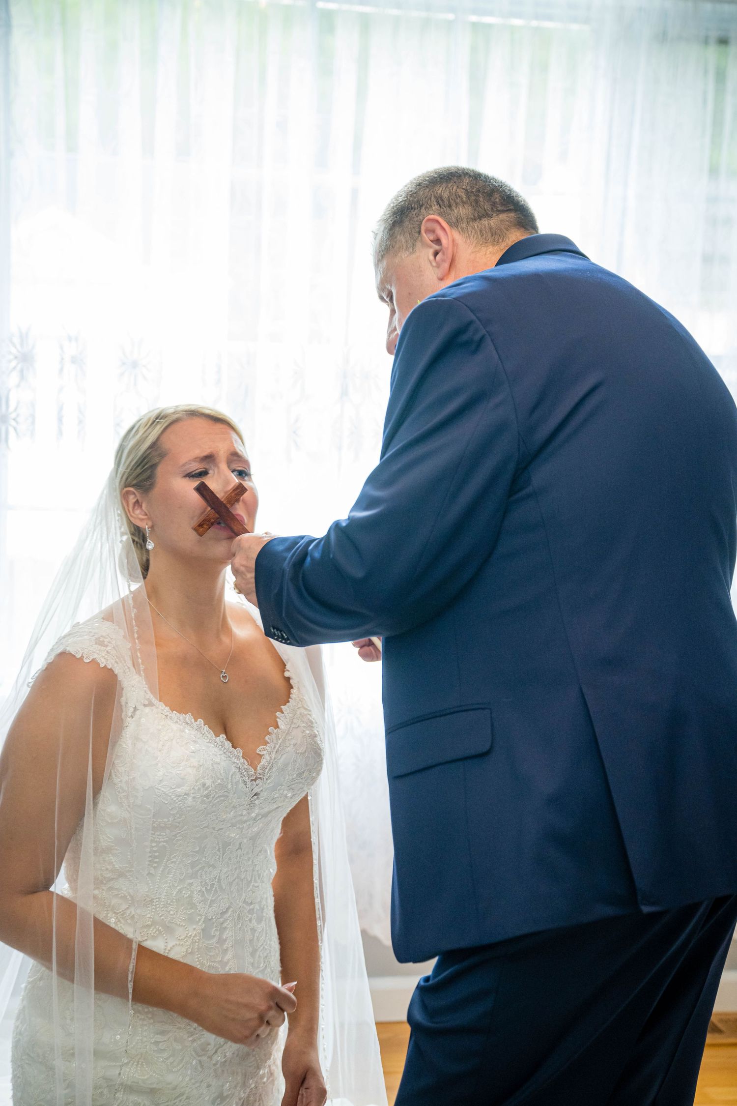 FATHER BLESSING BRIDE AT THEIR HOME FOR HAPPY AND BLESSED MARRIAGE.