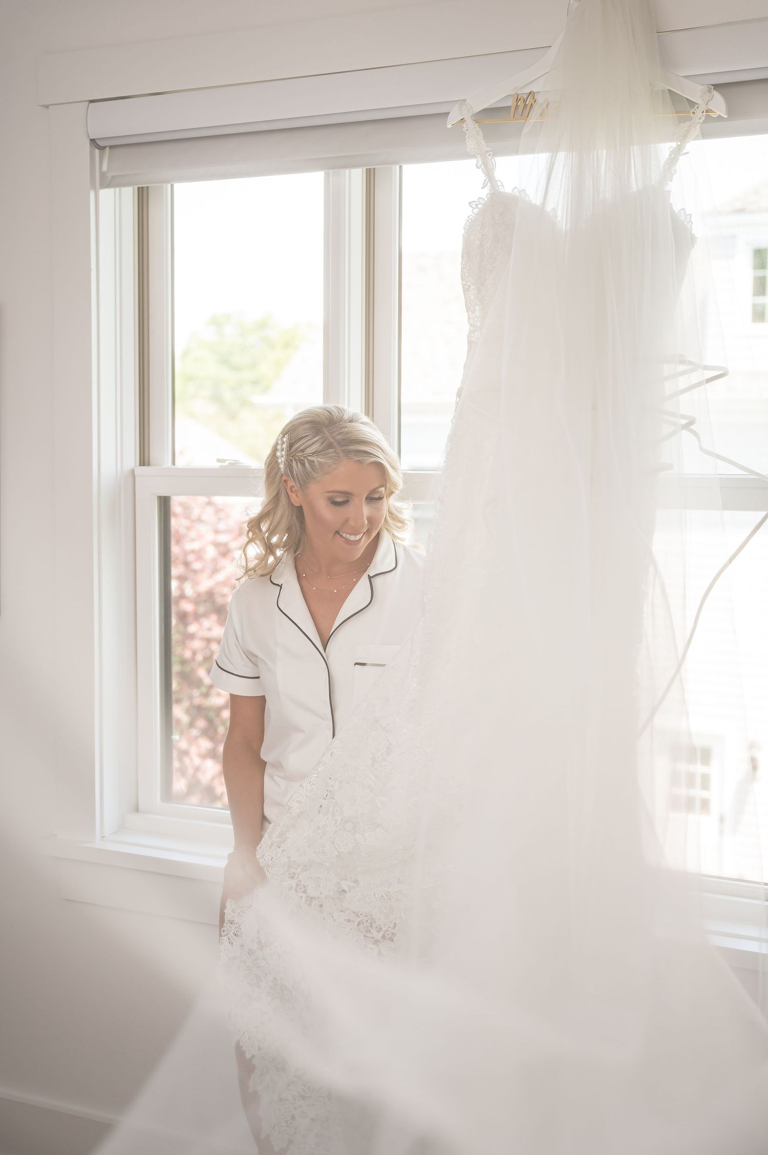 A series of soft, ethereal photos showing someone in a white wedding dress getting ready by a sunlit window.