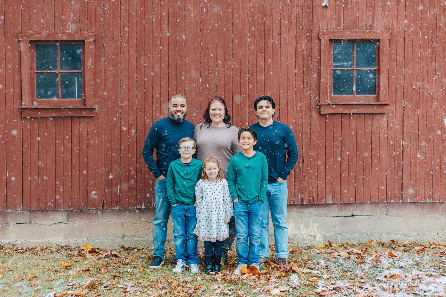 A series of candid family moments showing playtime and bonding in a cozy living room setting.