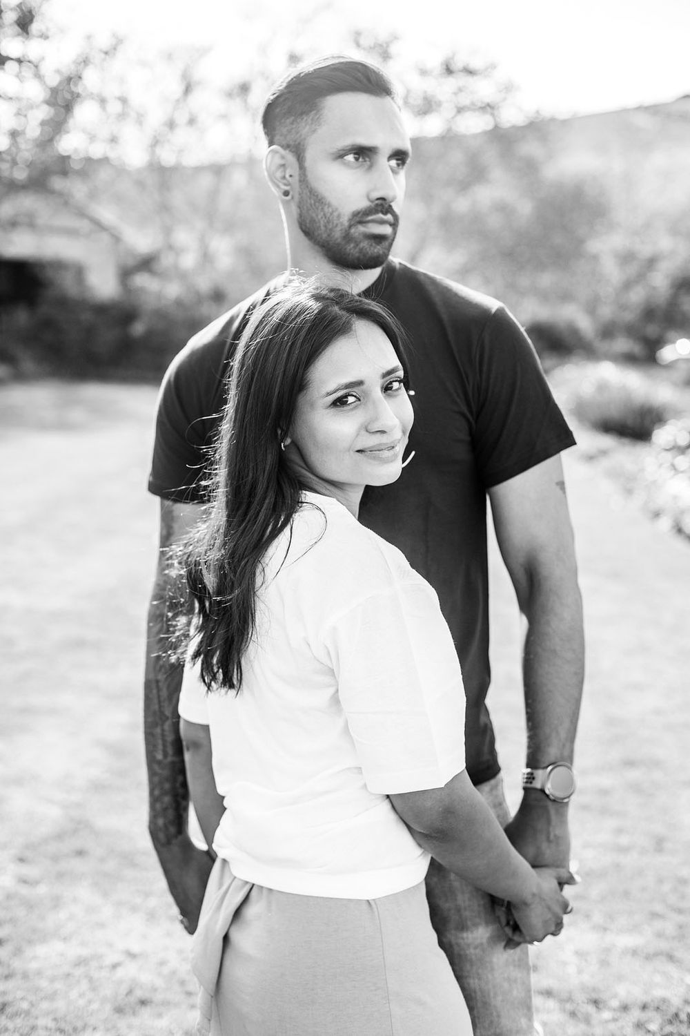 couple holding hands during fun photoshoot melbourne