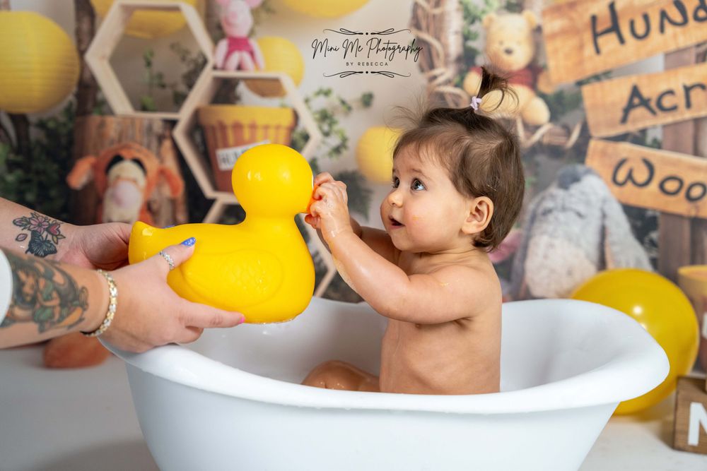 girls cake smash with bubble bath splash theme with rubber duck