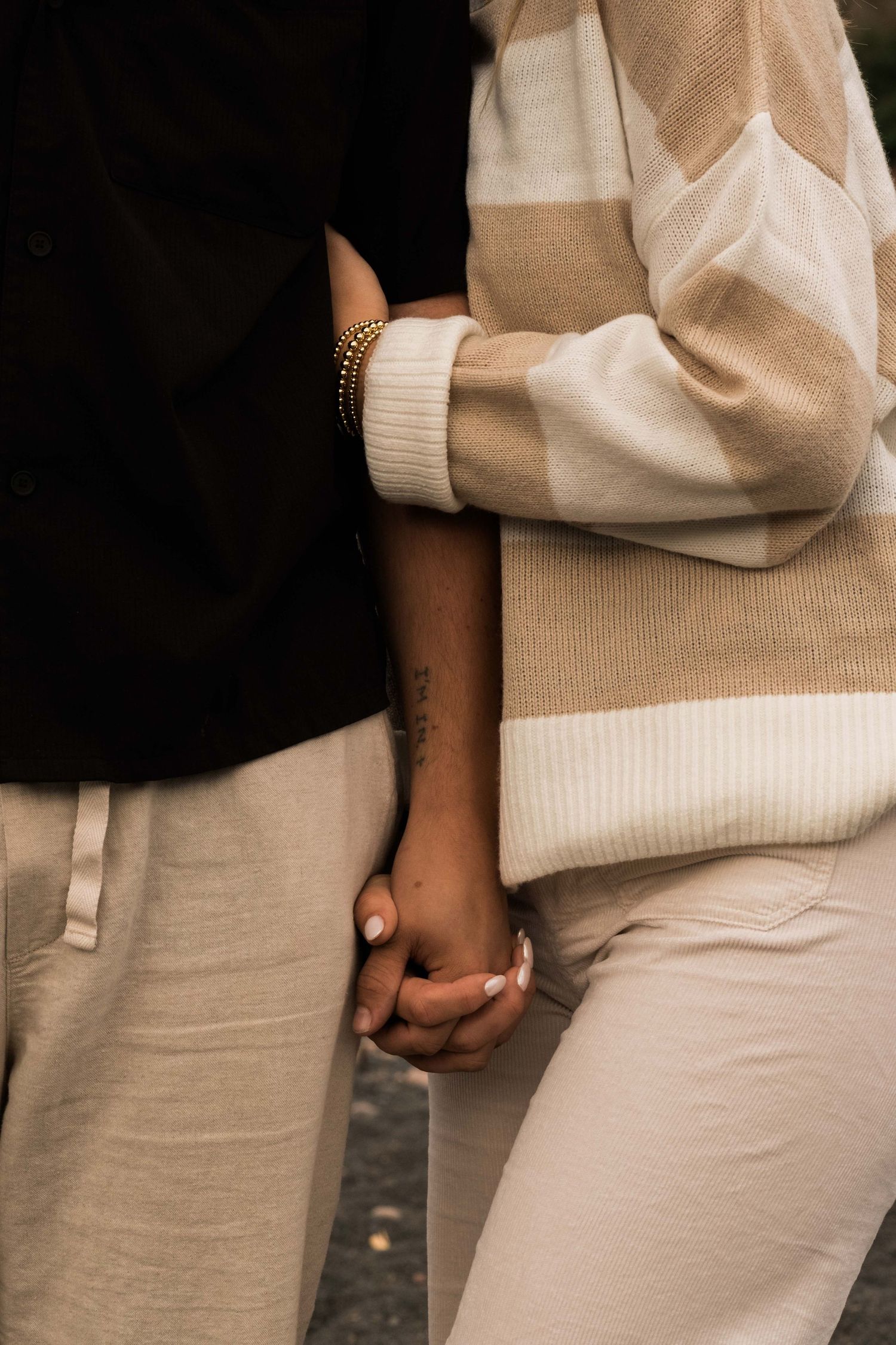 Detailed shot of a couple holding hands in Duluth Minnesota