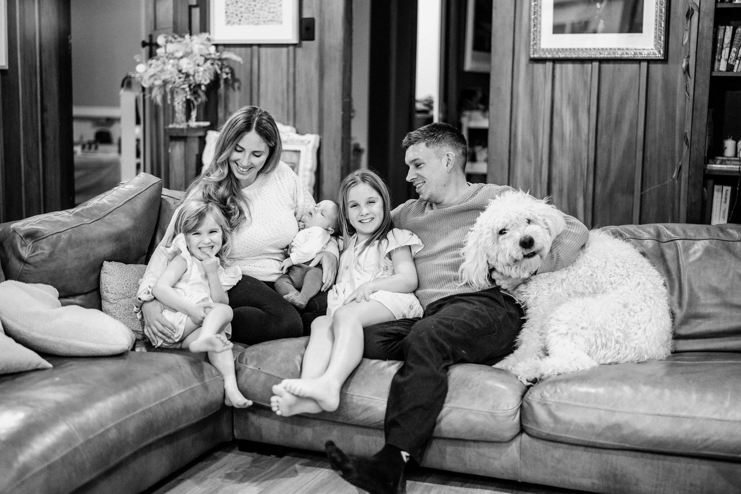 family photo with three kids and a dog