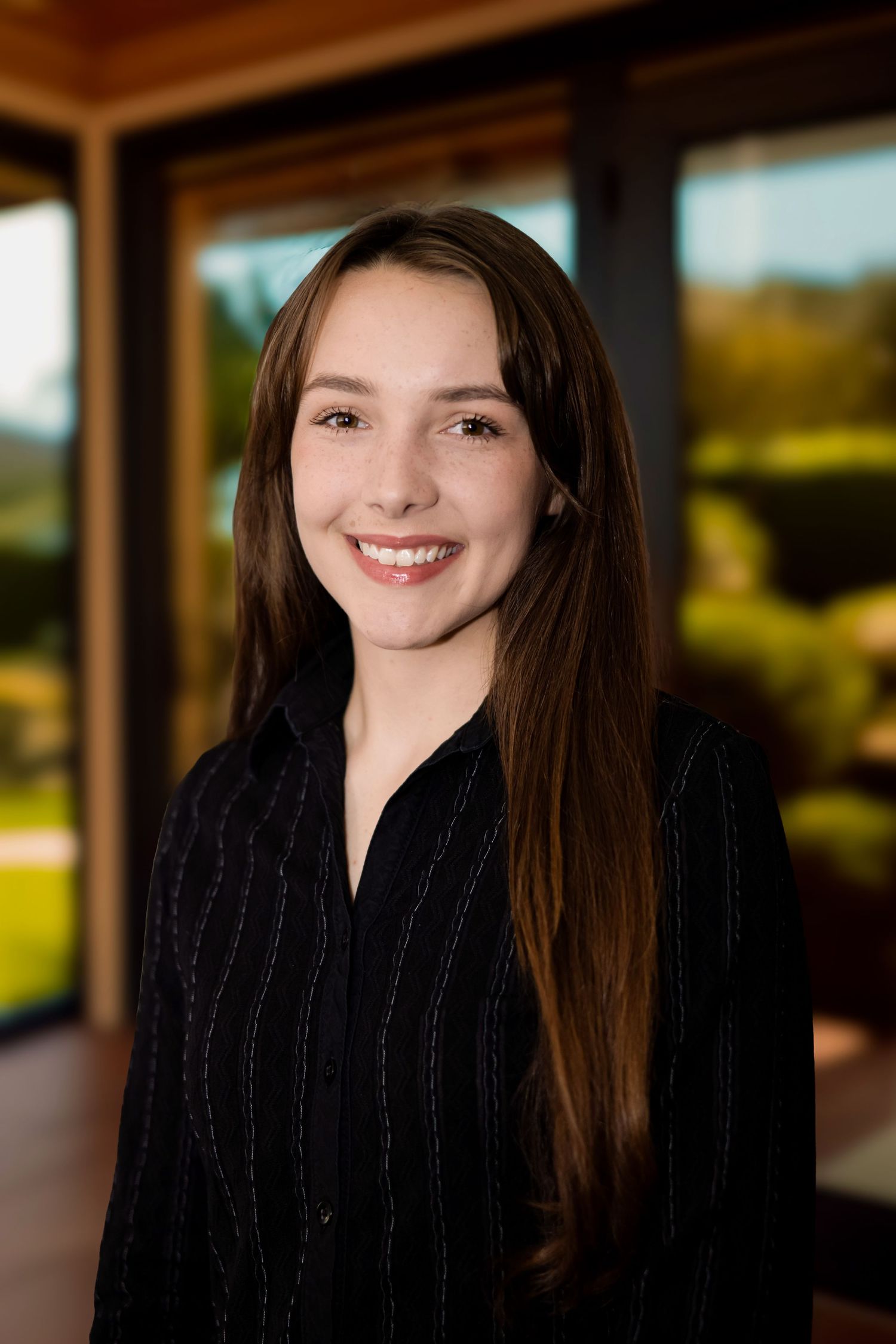 Professional headshot medical professional dentist Livingston Montana friendly approachable smile portrait commercial photography branding