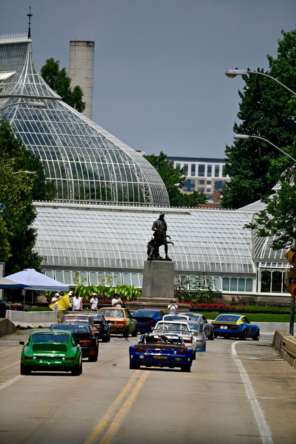 classic car race of cars larger than 2.0L engines racing across panther hollow bridge towards Phipps Conservatory. PVGP 2026