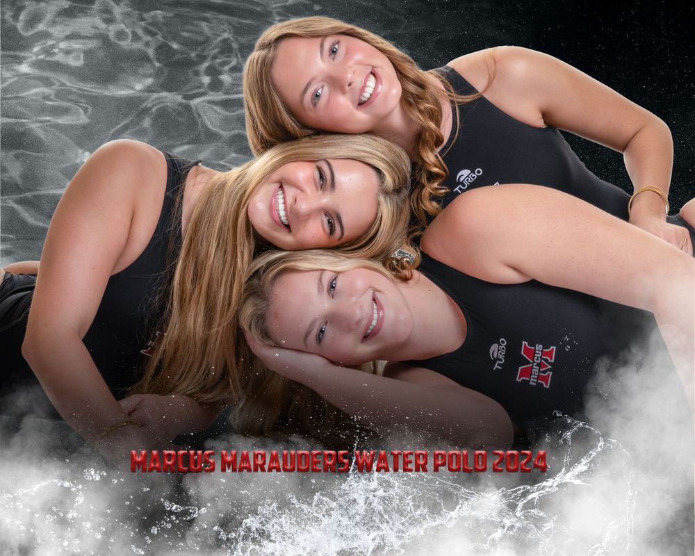 Three cheerleaders in black uniforms pose together for a team photo with a smoky background effect.