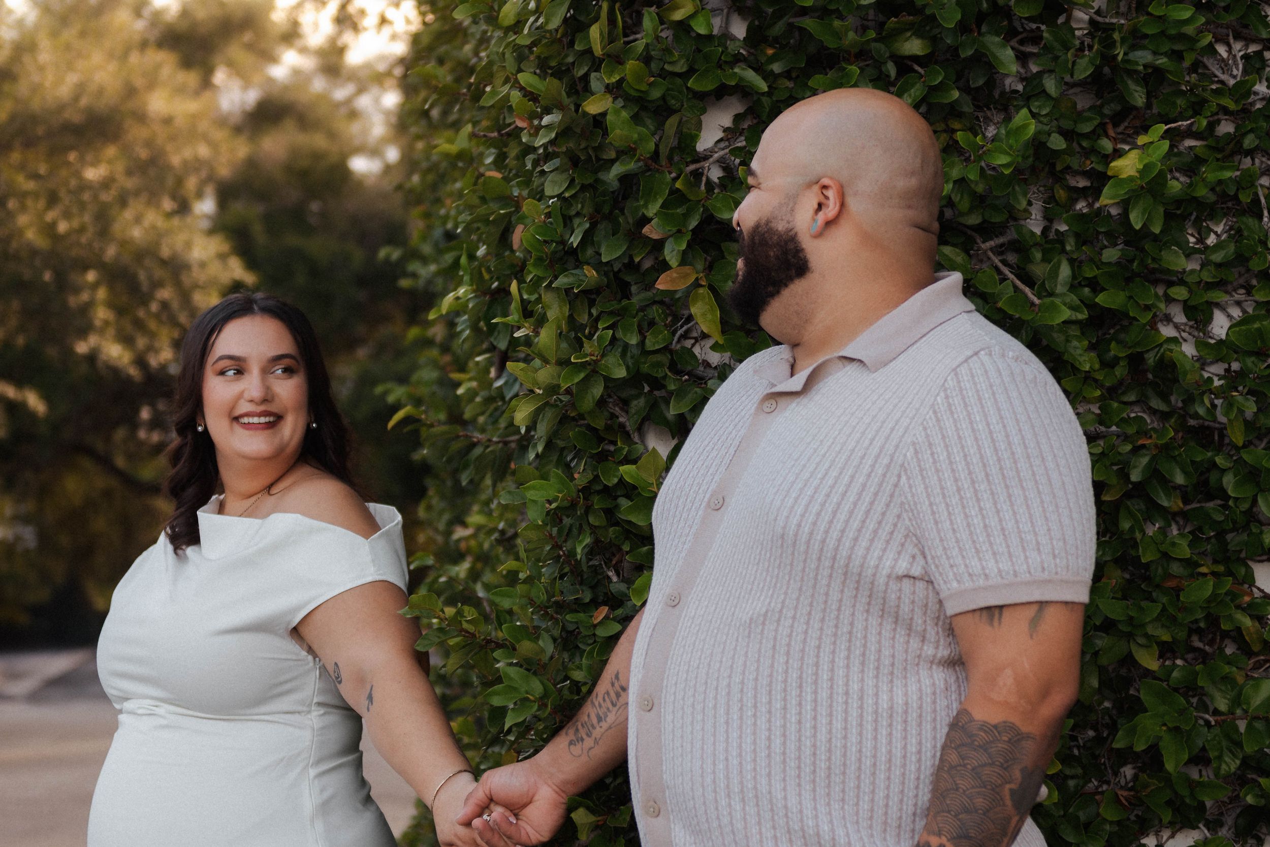 Puerto Rican couple during an engagement session in Downtown Winter Garden, Florida by a couples photographer.