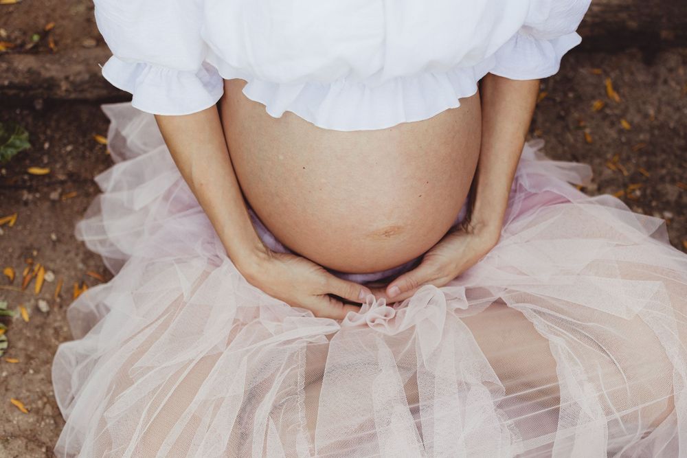 A pink tulle tutu skirt is shown in a series of close-up detail shots highlighting its delicate layers and texture.