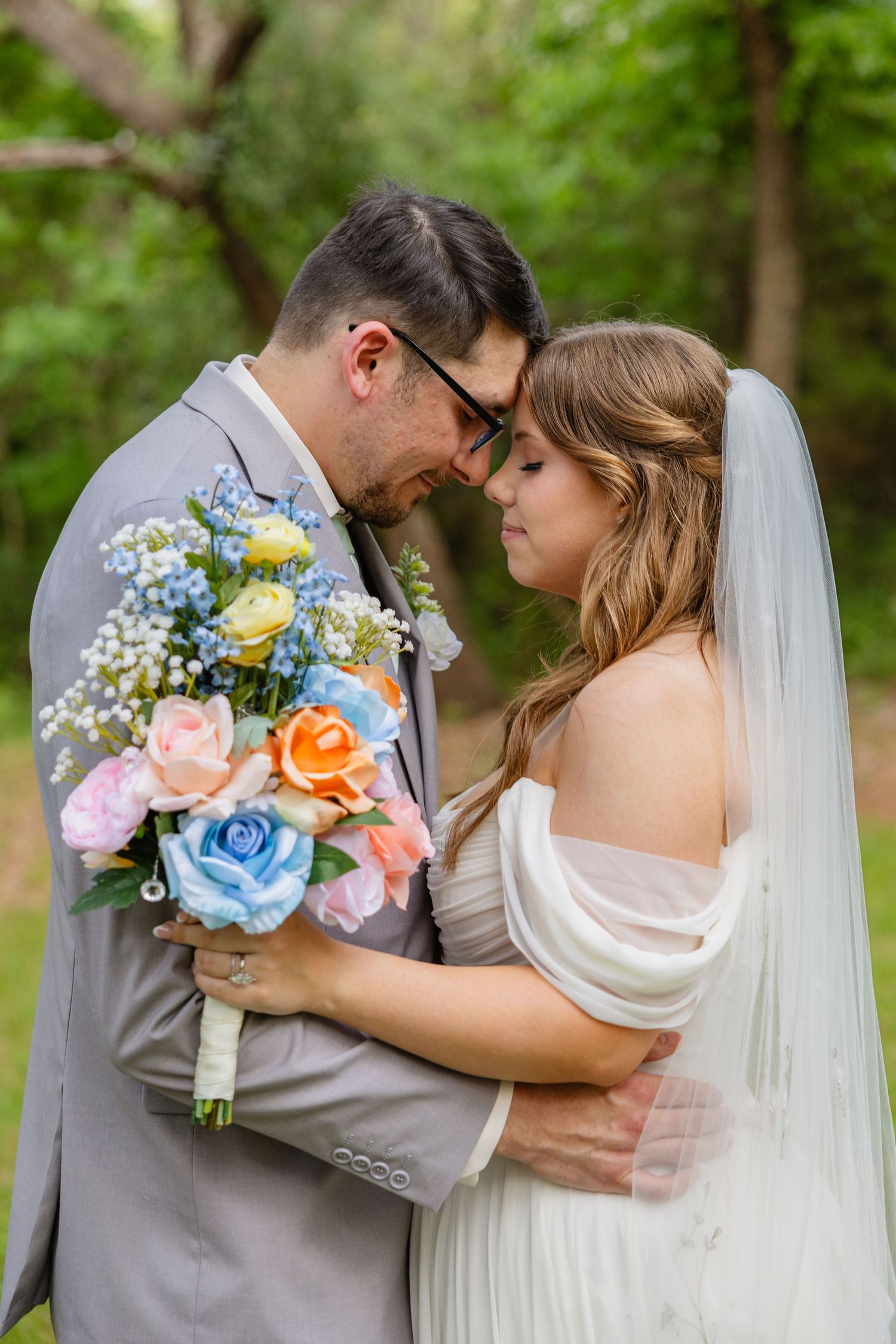 a cute couple kissing for a wedding photo