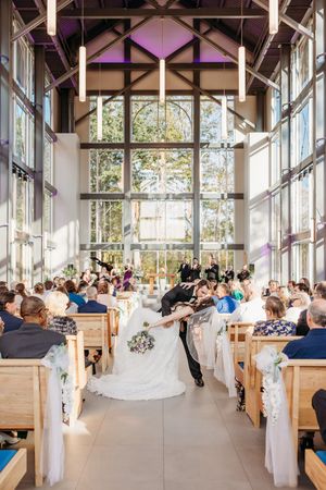 Bride and Groom dip kiss during processional. Cincinnati Wedding photographer. NKY wedding photographer. Chicago Wedding Photographer.