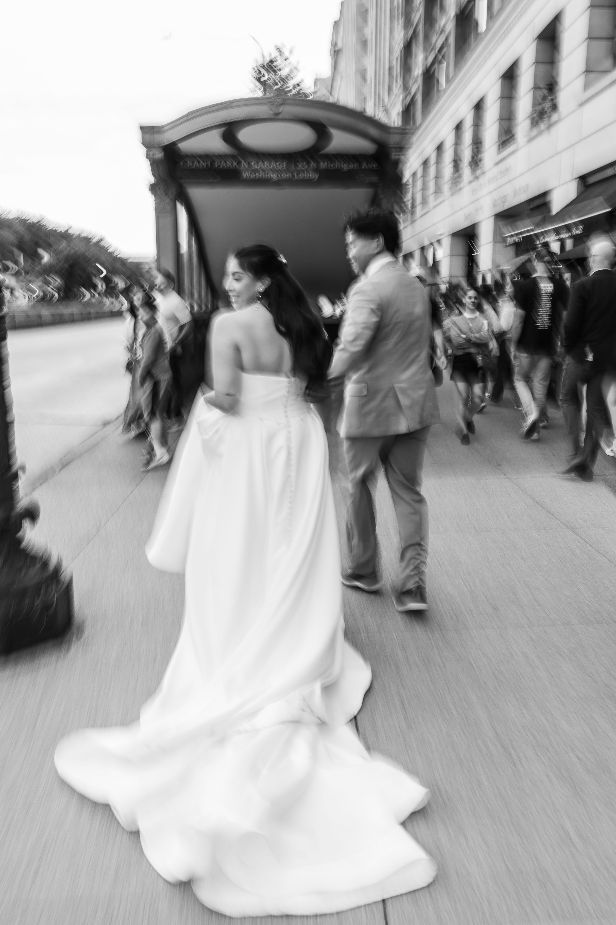 Wedding portrait with motion in downtown Chicago. Cincinnati Wedding photographer. NKY wedding photographer. Chicago Wedding Photographer.