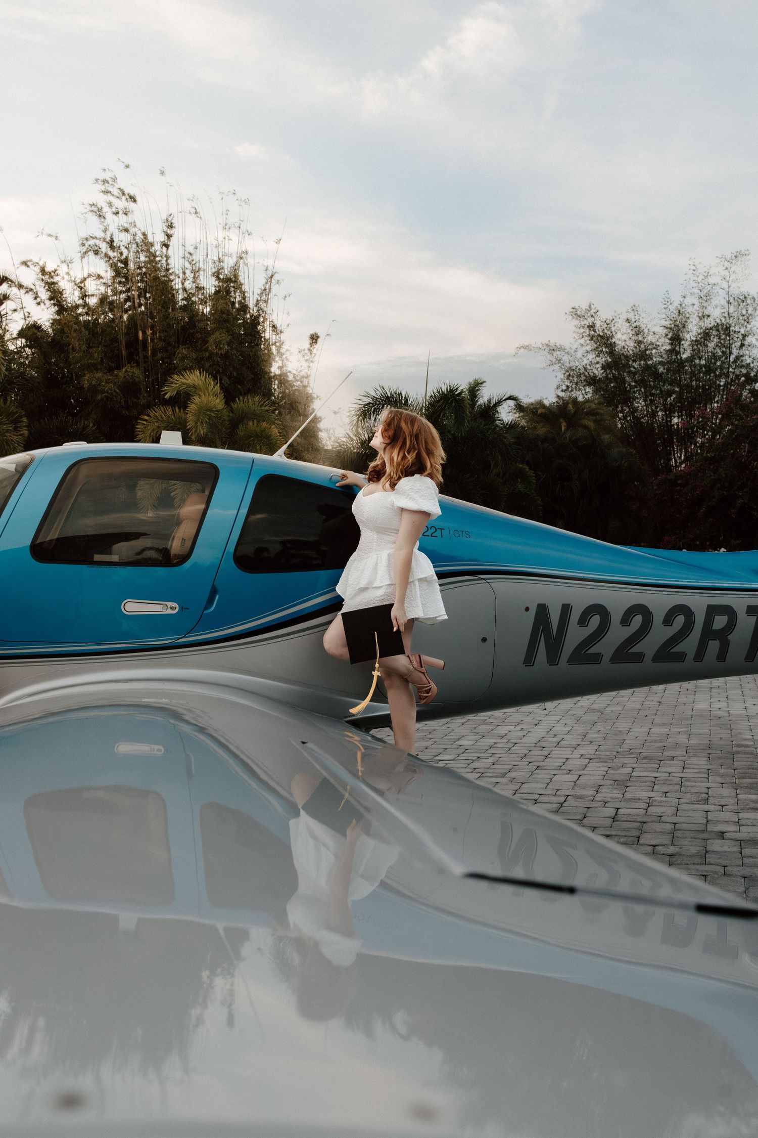 Senior graduation photoshoot with private plane jet in Florida by Lemon & Honey Co.