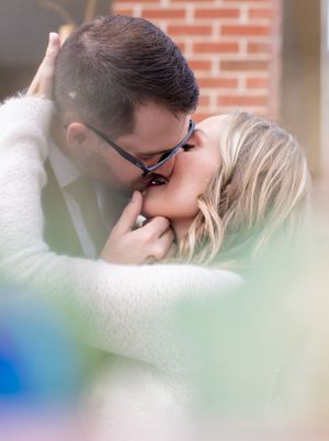 Intimate romantic portrait through soft focus with dreamy bokeh effect.
