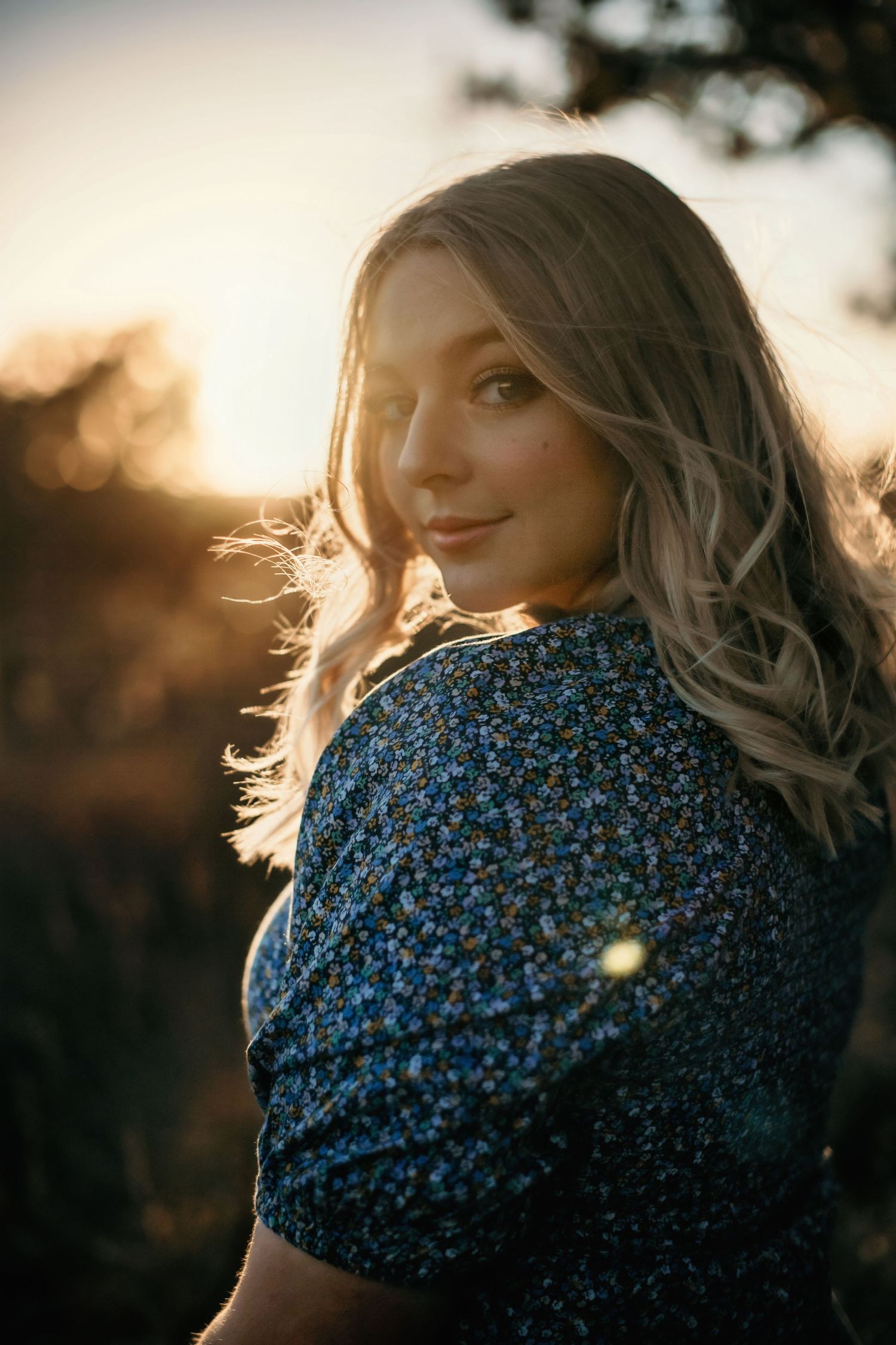 "Blonde Senior Girl looking over her shoulder"