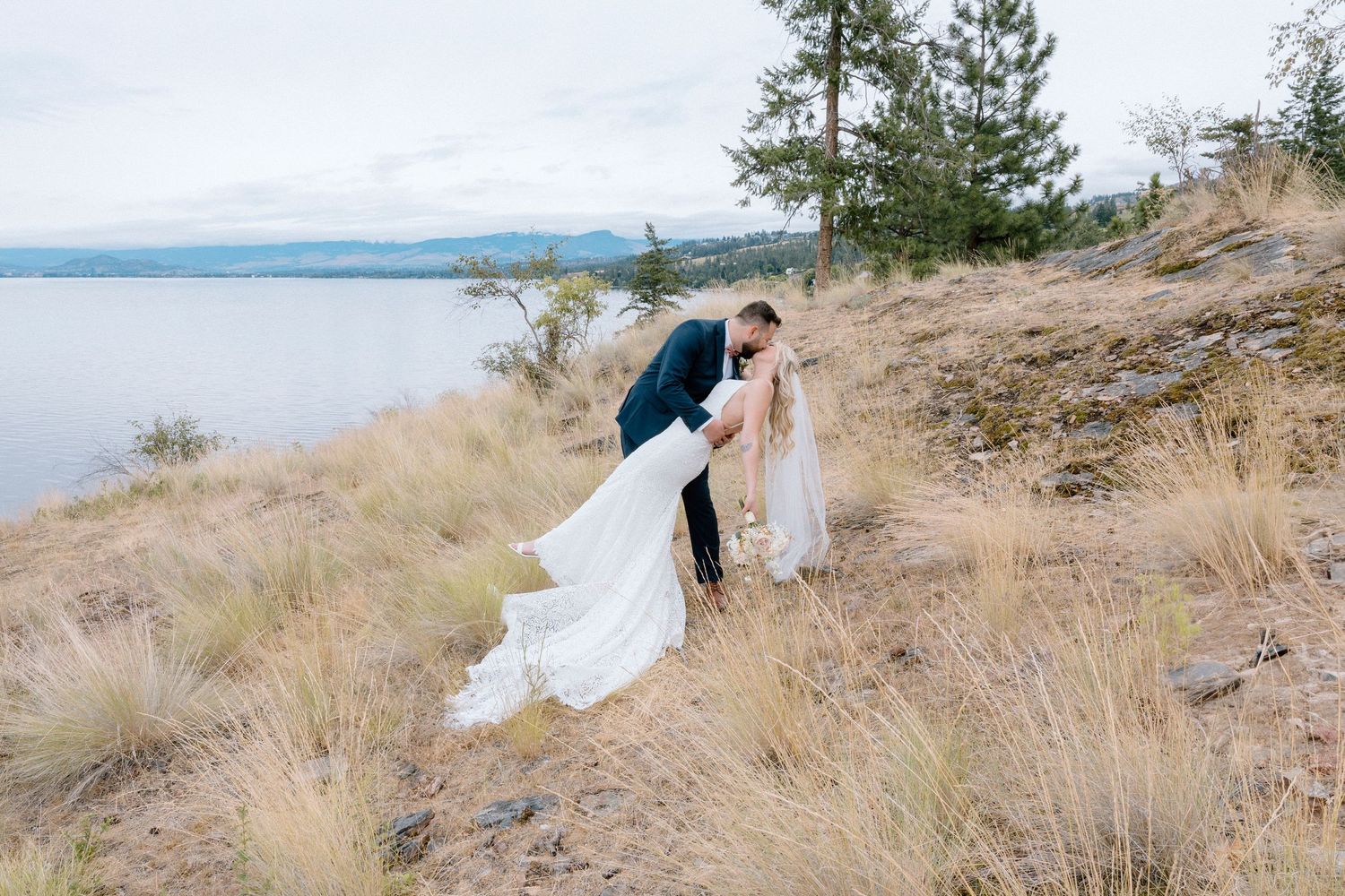 Destination wedding ceremony overlooking Okanagan mountain views