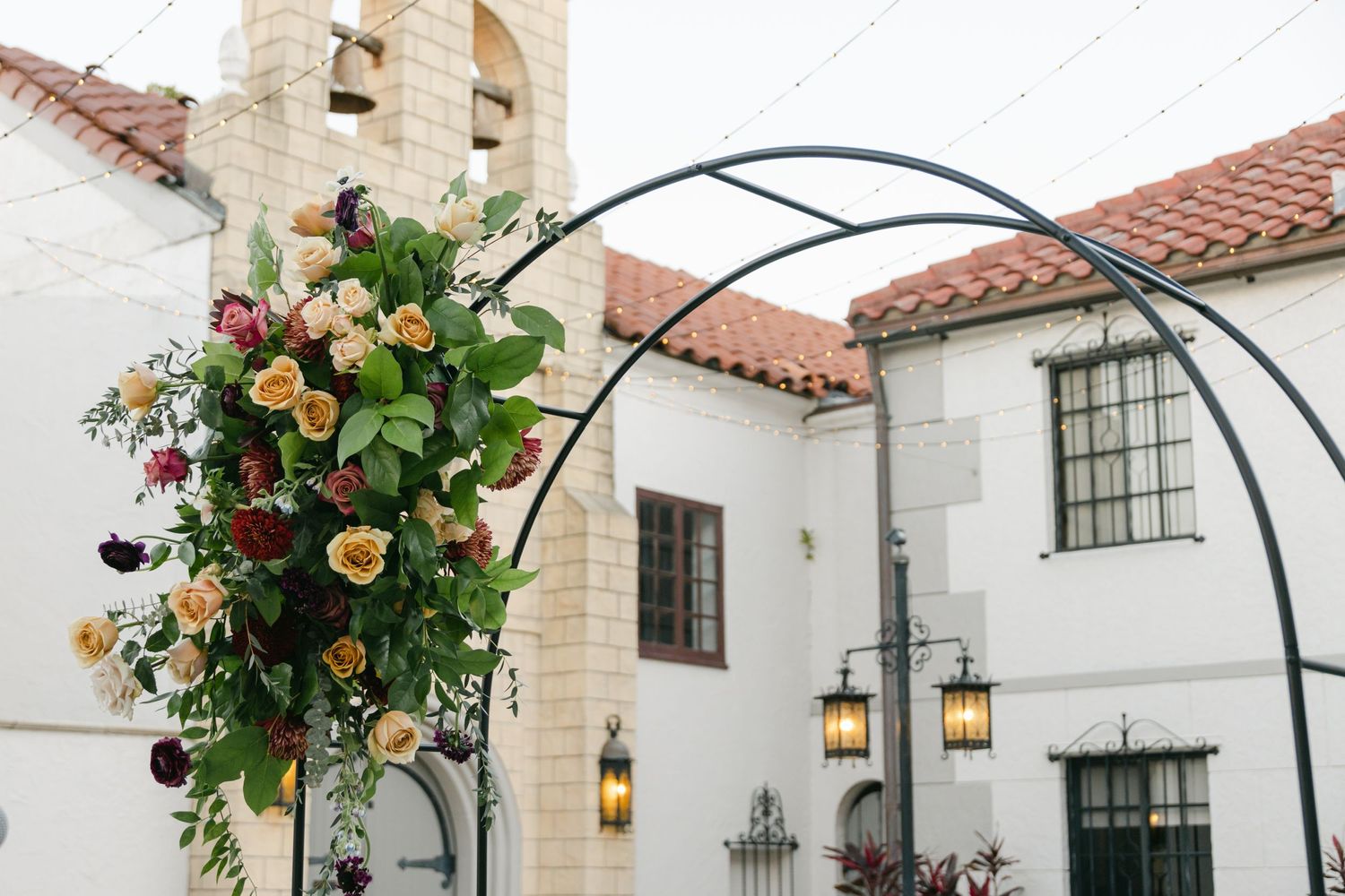Floral arrangement at a Bradenton wedding venue The Bishop Museum in their charming courtyard.