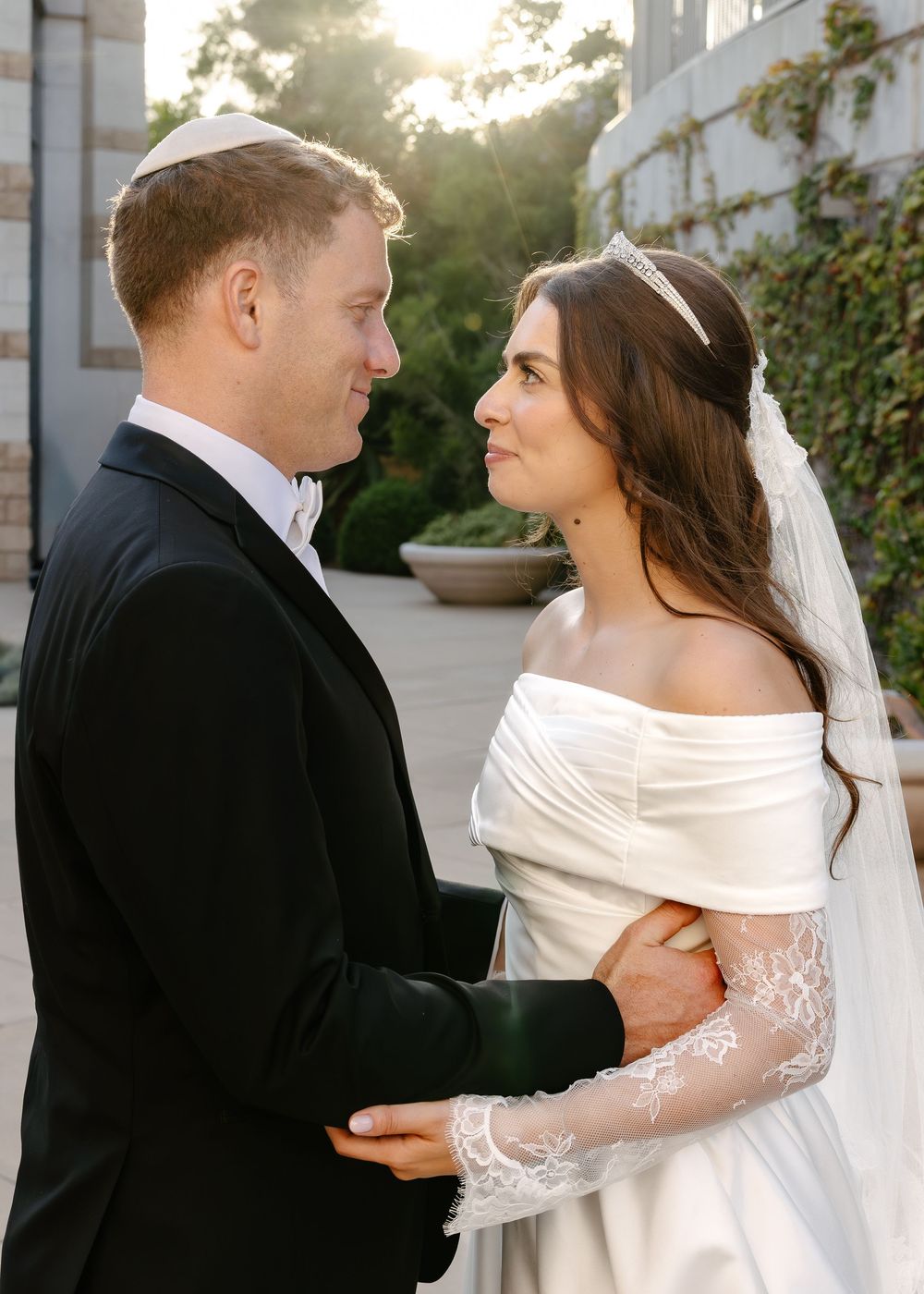 A bride and groom share romantic glances in a sequence of wedding photos outdoors at sunset.
