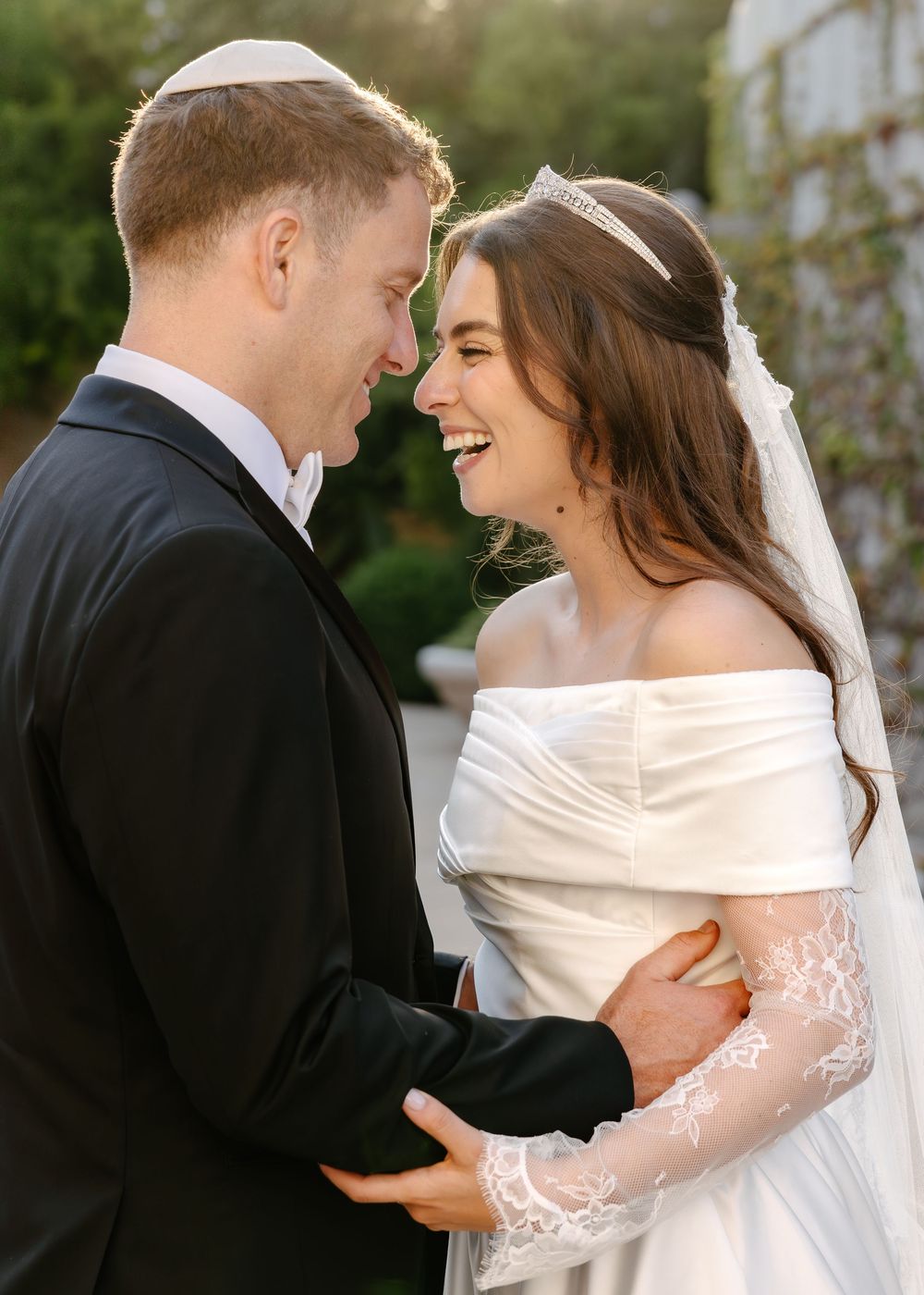 Romantic wedding couple series showing five tender moments of embrace and laughter in an outdoor garden setting.