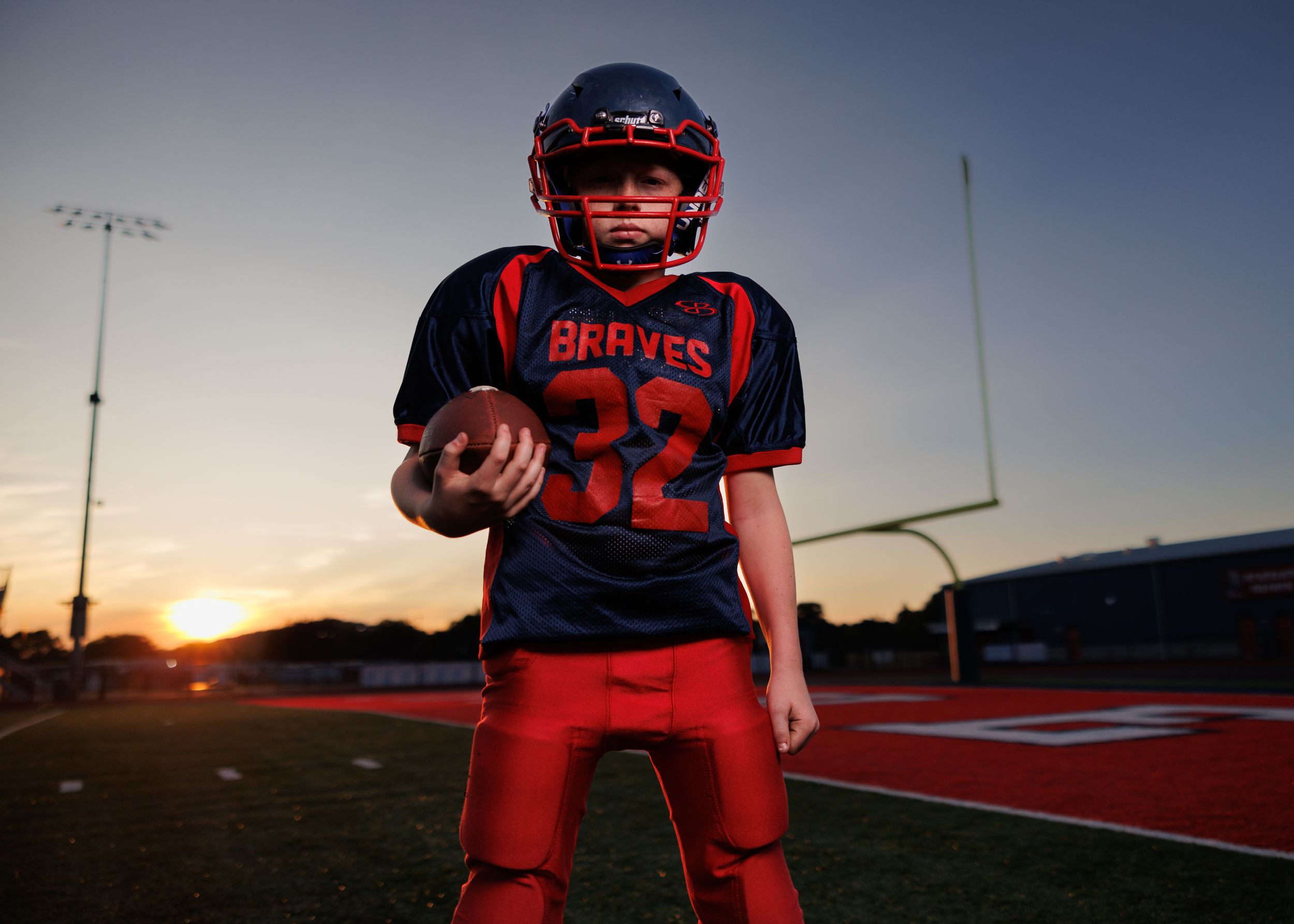 football player in Indian Valley High School stadium in Gnadenhutten, Ohio.