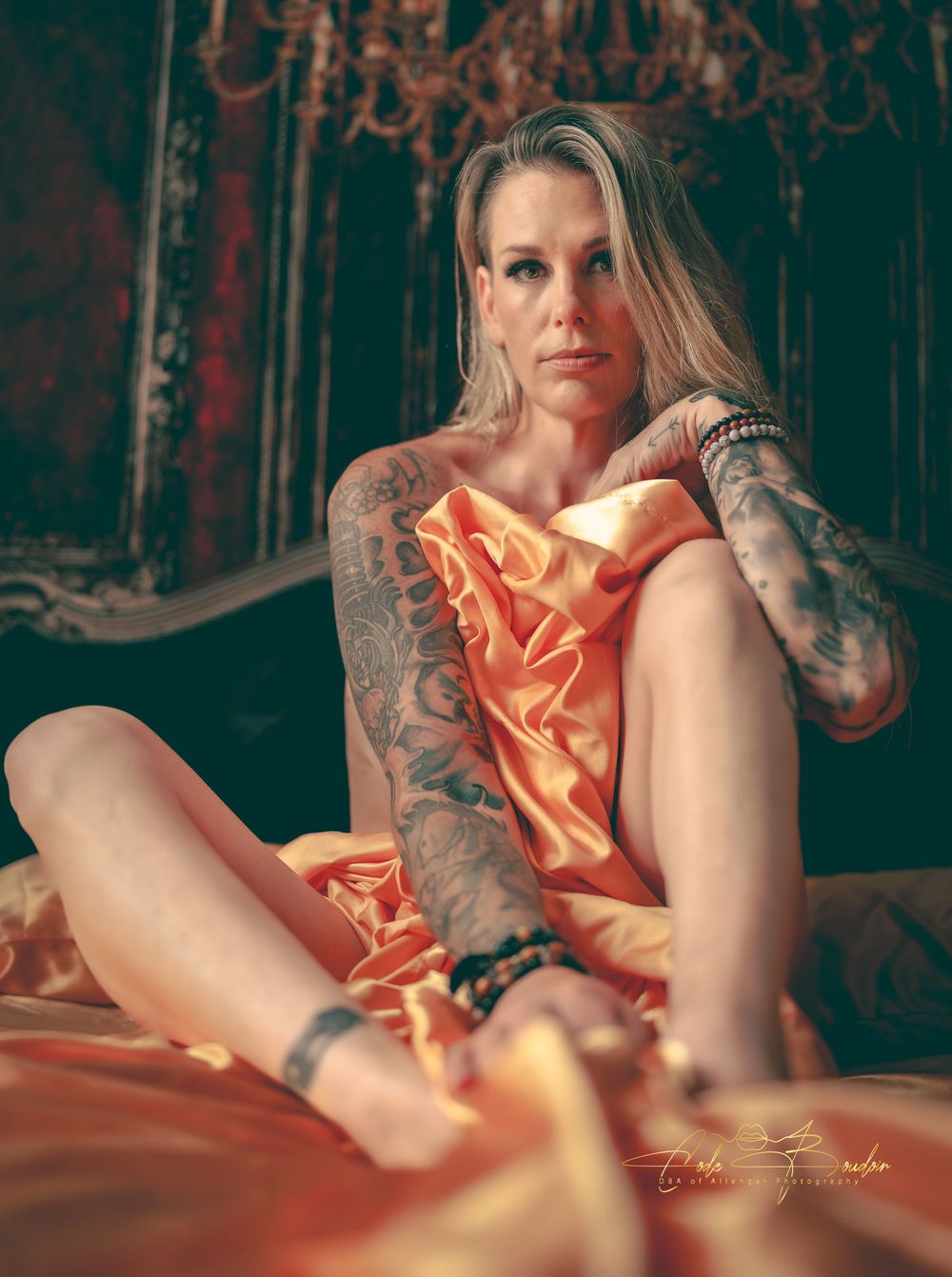 Woman laying in bed wearing lingerie