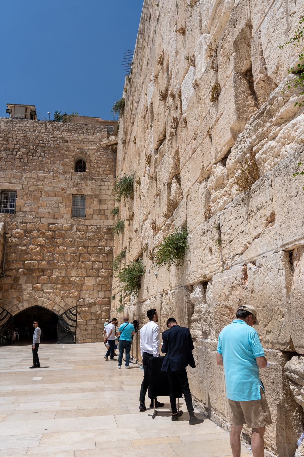 Visitors gathering at the Western Wall in Jerusalem's Old City.