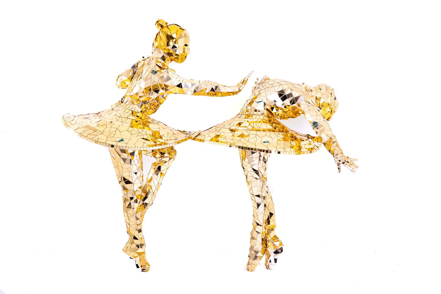 Abstract golden pattern of delicate geometric shapes arranged in a horizontal sequence.