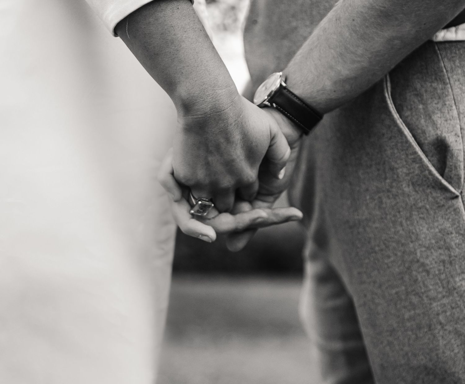 Bride and groom hold hands at Abbotsbury Wedding venue The Abbey house. Abbotsbury wedding. Abbey House wedding. Bridport wedding photograph