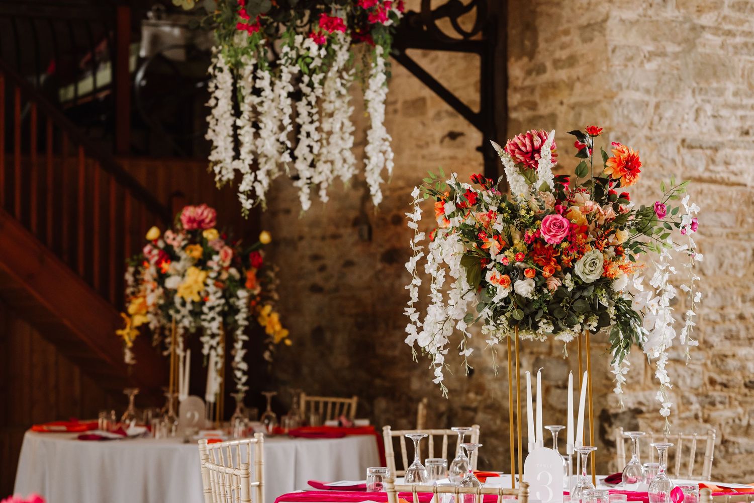 Bright artificial wedding floral display. Barn Wedding Venue Dorset - Kingston Country Courtyard Woodland wedding venue Dorset
