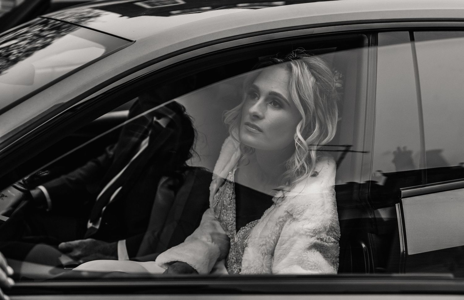 Candid photography of a bride in the wedding car at Poole Guildhall, Dorset. BCP Registration services. Poole wedding. Registry office Poole
