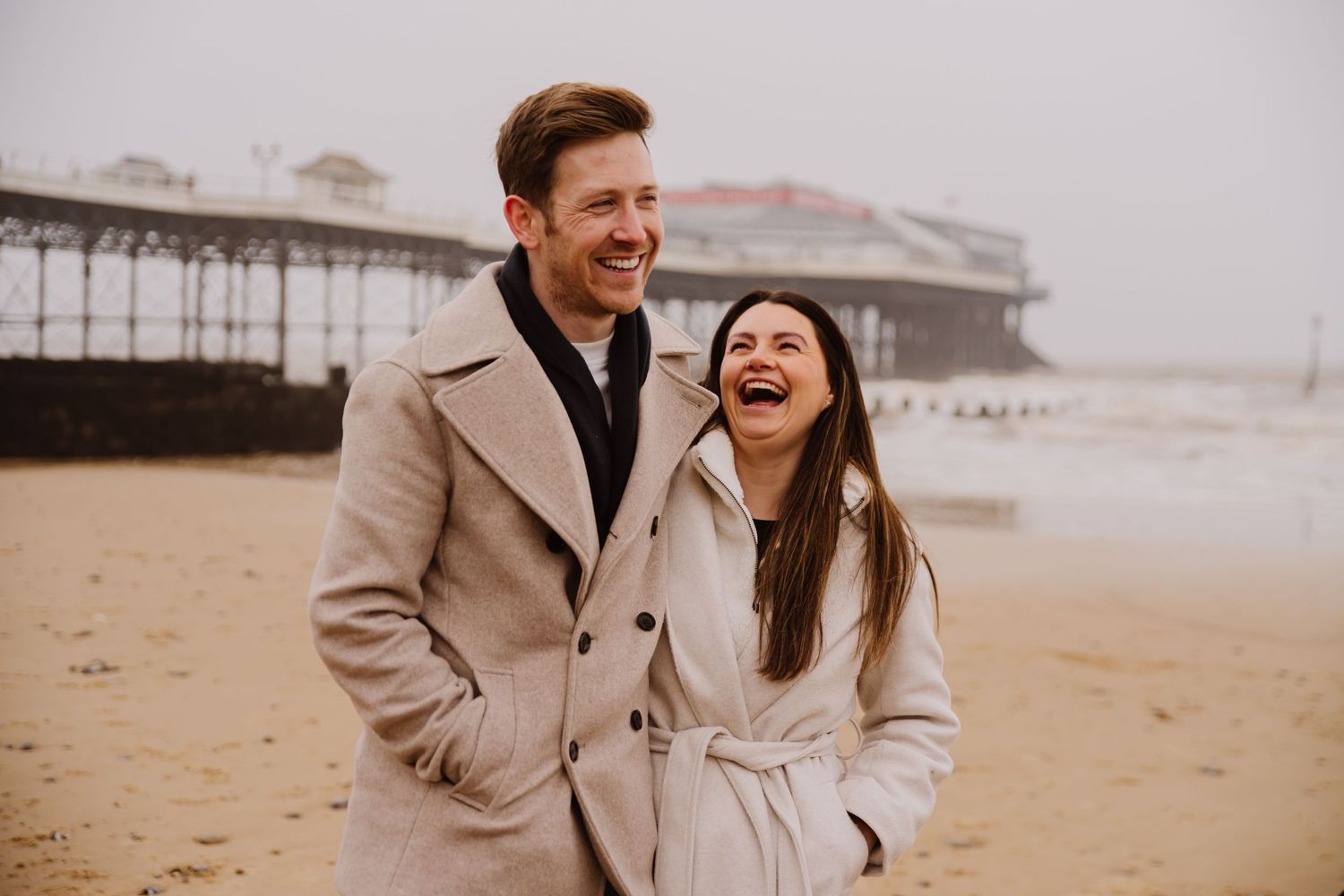 Beach couple engagement photography photo shoot, candid, fun, Dorset, Somerset, Hampshire, Devon. Dorset Photographer. Beach photographer.