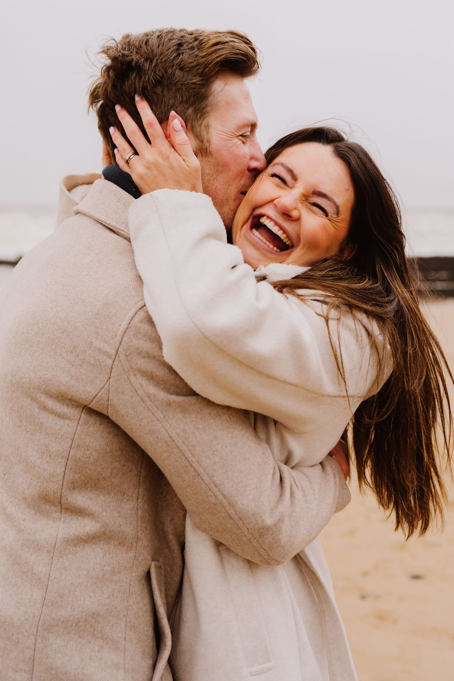 Beach couple engagement photography photo shoot, candid, fun, Dorset, Somerset, Hampshire, Devon. Dorset Photographer. Beach photographer.