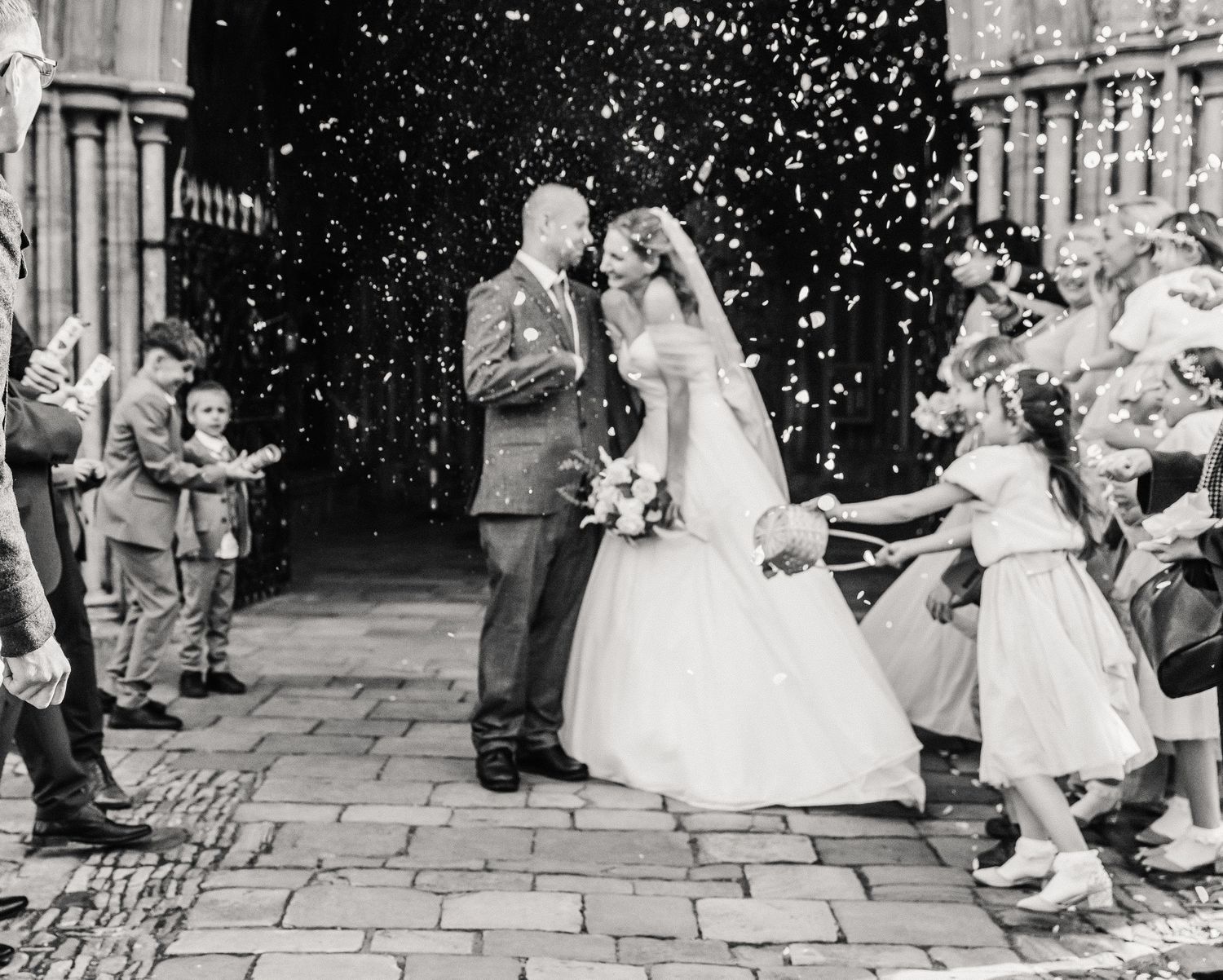 The Priory Church, Christchurch, Dorset wedding photography. Bride and Groom candid wedding photography. christchurch bridal