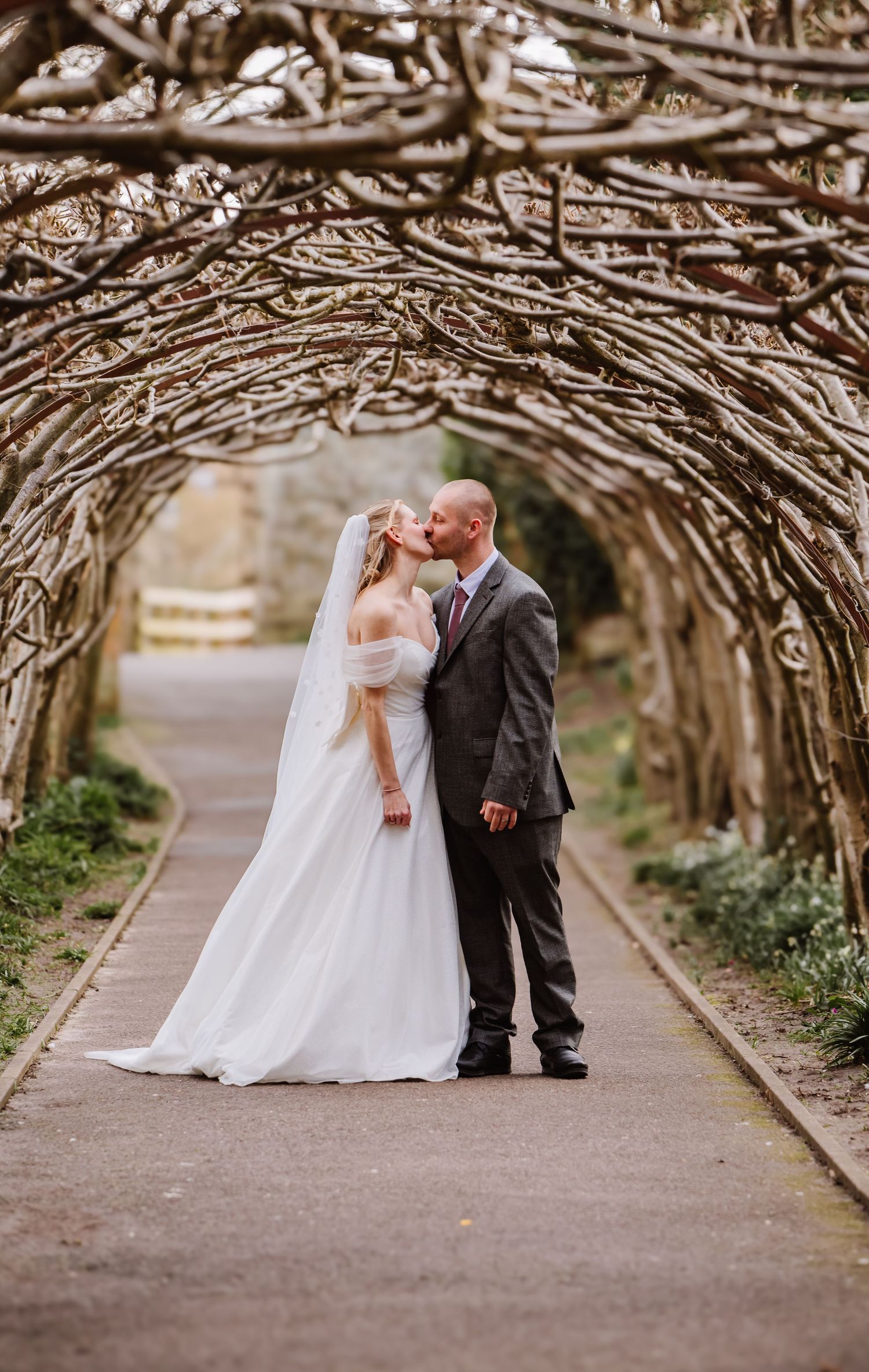 The Priory Church, Christchurch, Dorset wedding photography. Bride and Groom candid wedding photography. christchurch bridal