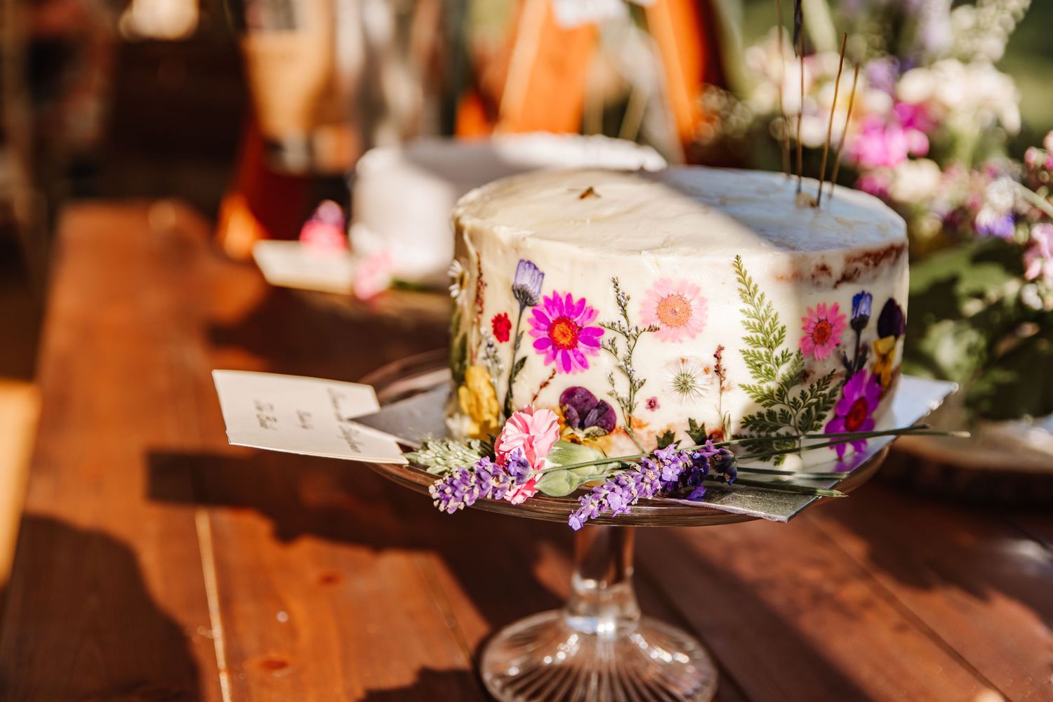 Shillingstone Hous., Shillingstone Dorset Wedding Venue. Dorset outdoor wedding. Manor house wedding Dorset.  wedding cake with flowers